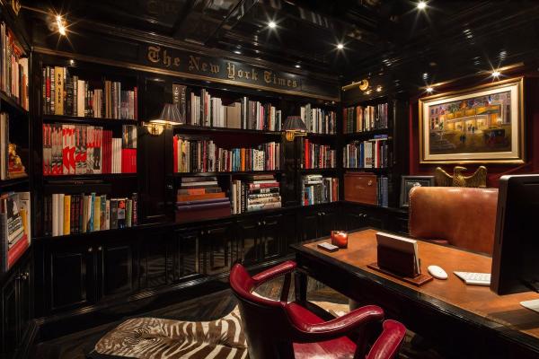 of-course-theres-also-a-wood-paneled-library-the-wall-is-engraved-with-the-new-york-times