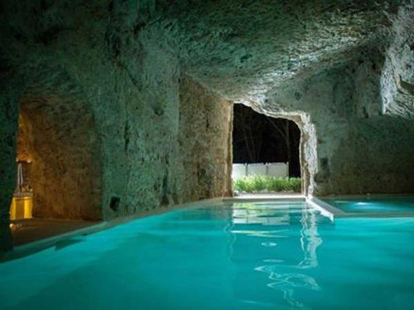 the-pool-at-the-domus-civita-in-civita-di-bagnoregio-italy-is-hidden-in-a-cave-underneath-a-private-house-you-can-rent
